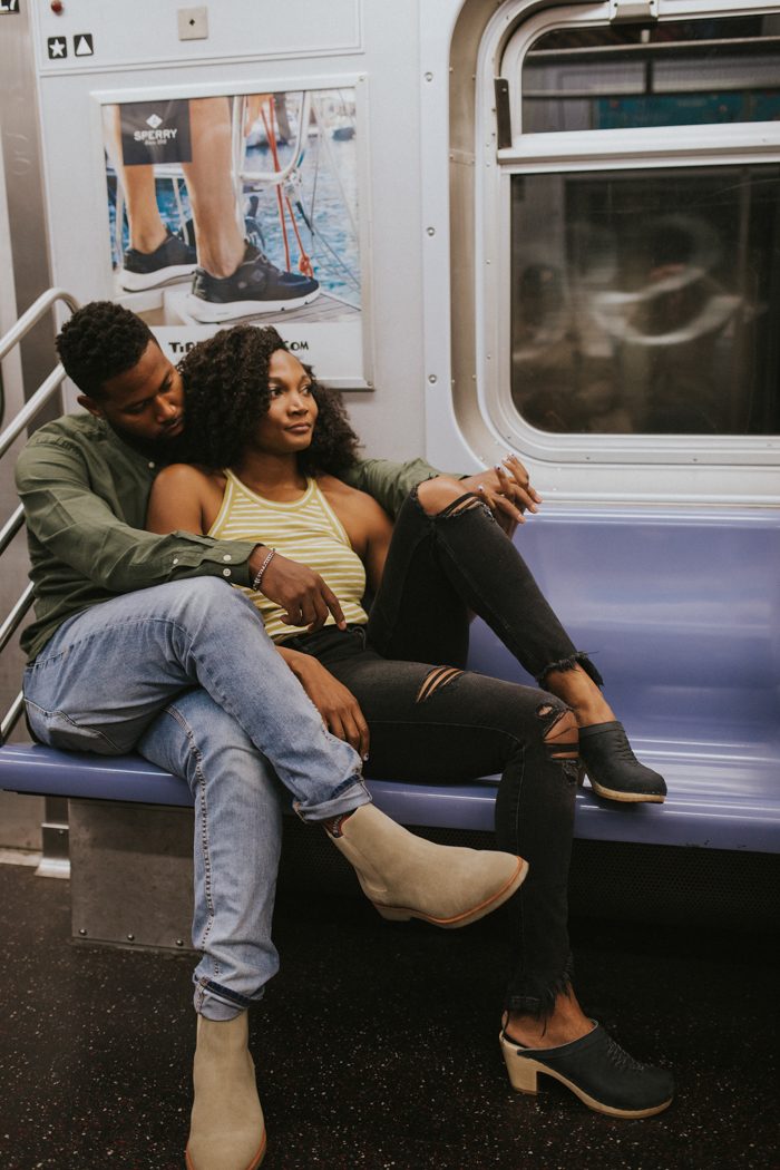 couple sitting on a subway