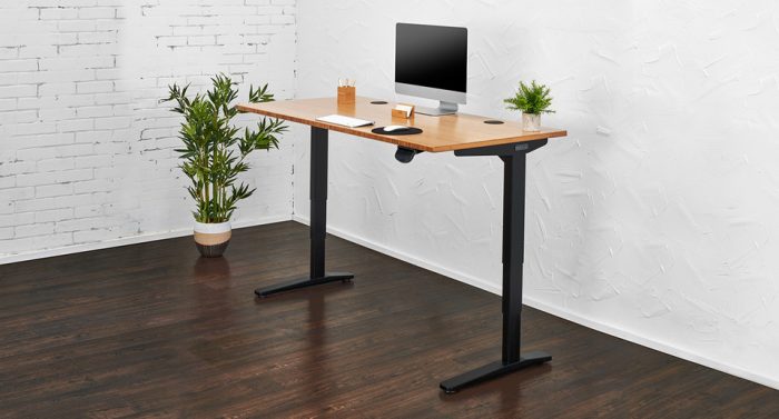 standing desk from Uplift photographer editing essential