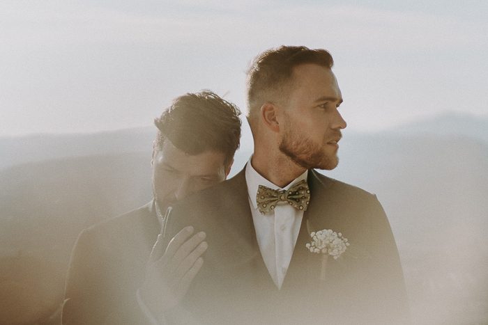 grooms embracing pinterest for wedding photographer branding graphic