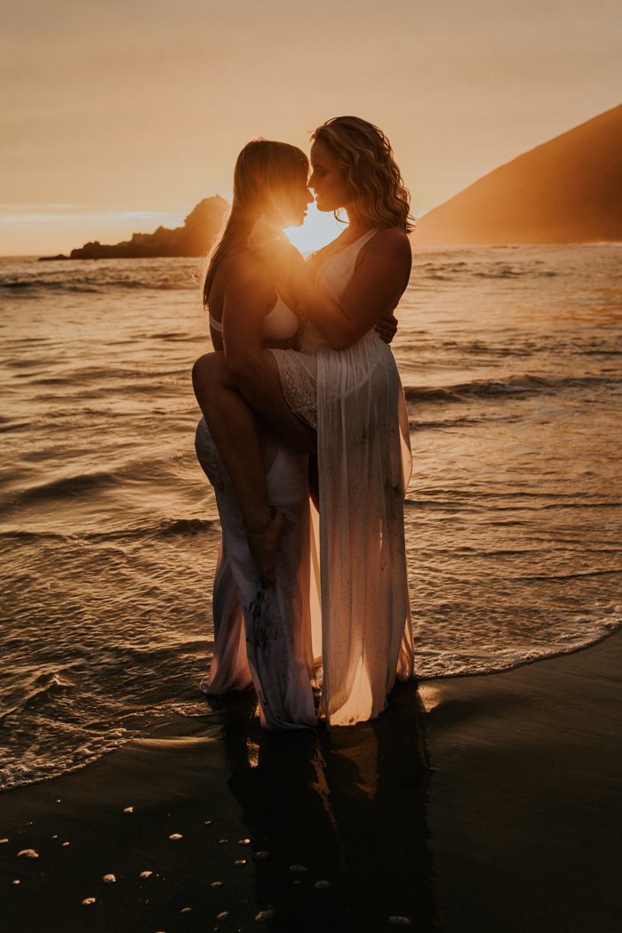 inclusive wedding photographer example couple with sunset behind them