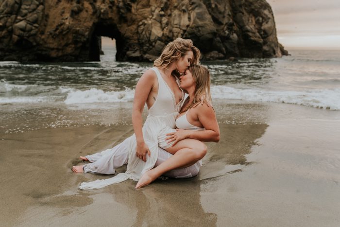 lgbtq couple on the beach