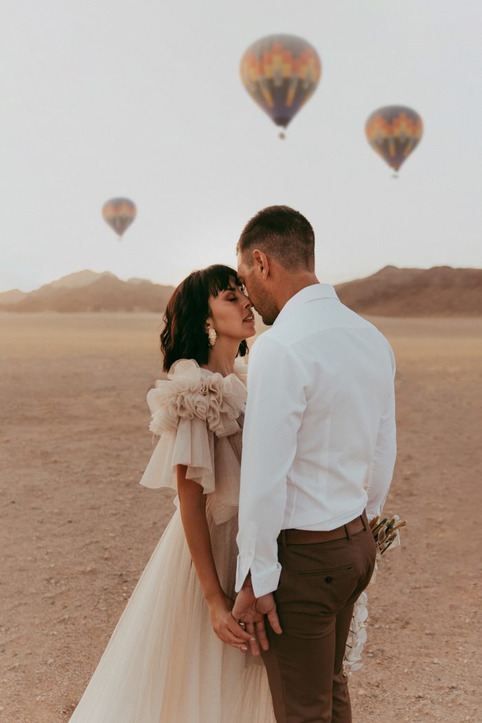 Wedding couple portrait with hot air balloons