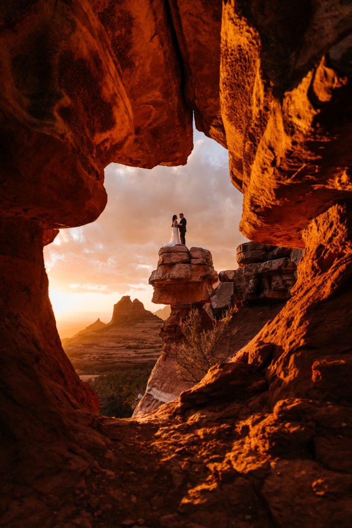 couple on top of butte in Sedona, Arizona