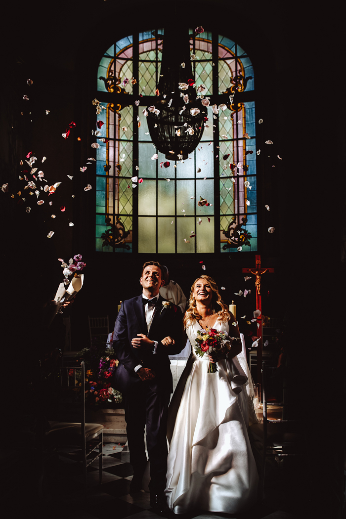 recessional photo in front of stained glass window