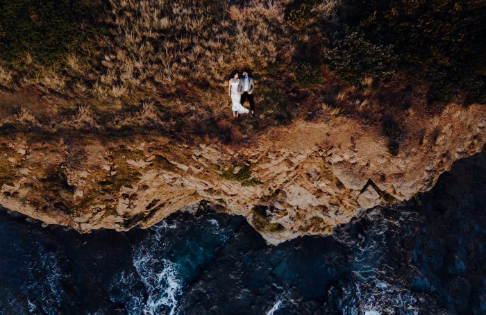 couple near cliff drone wedding photography