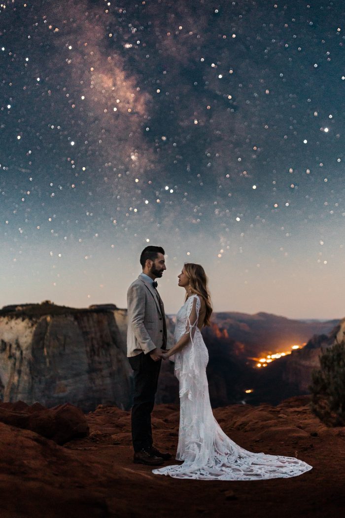 wedding day couple on top of mountain at night