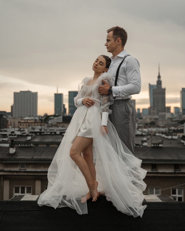 wedding day couple on city rooftop