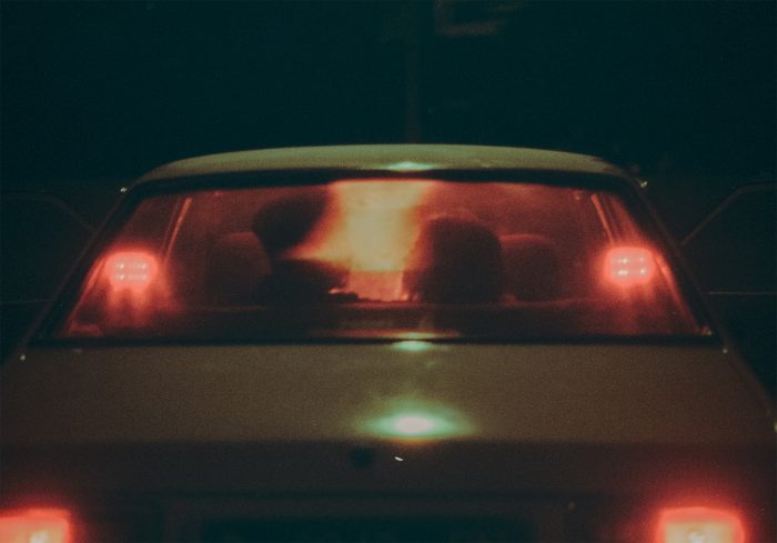 wedding film photograph of couple in car