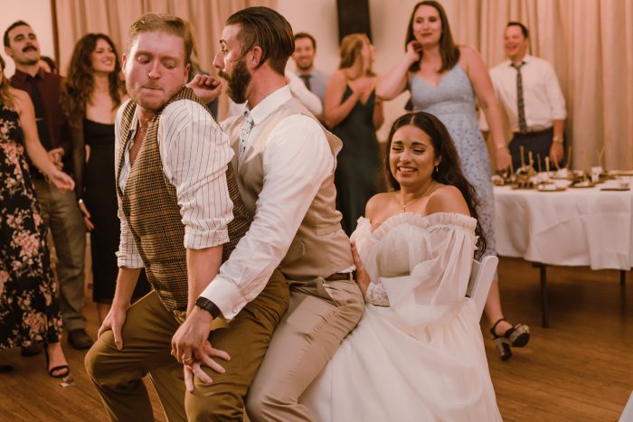 bride and groom getting lap dance funny wedding photo