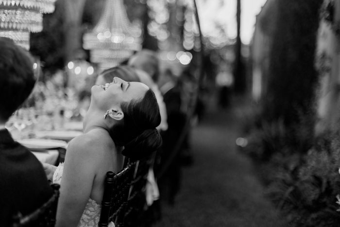 black and white wedding photo bride laughing
