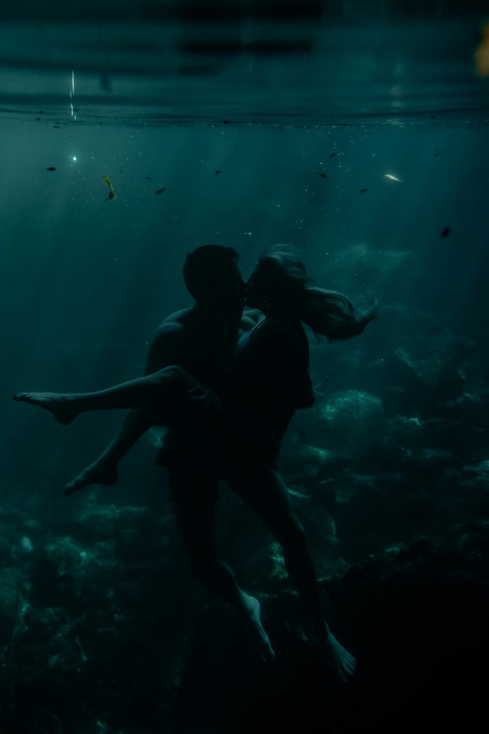 underwater portrait of couple