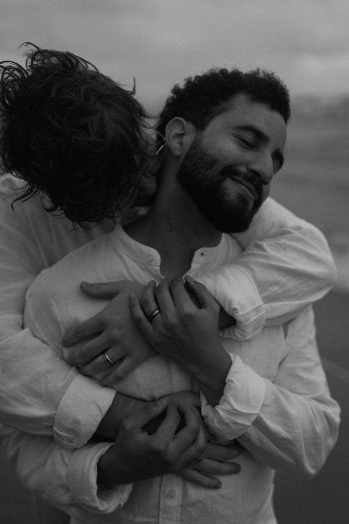 same-sex couple in black and white wedding day photo