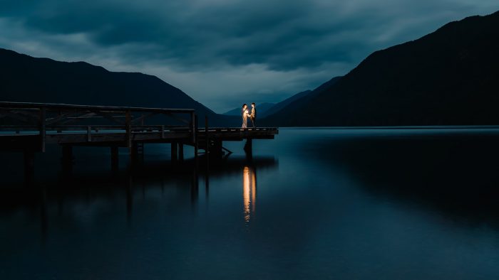 wedding couple on pier at night