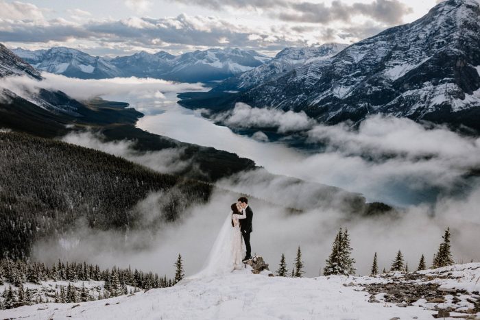 snowy mountaintop wedding portrait
