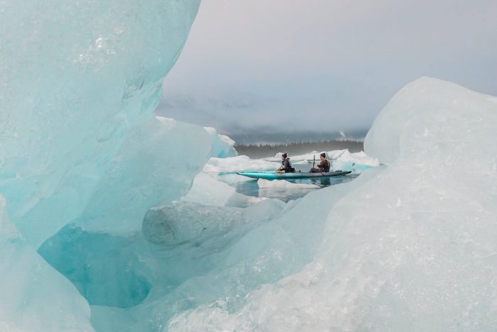 couple kayaking through ice